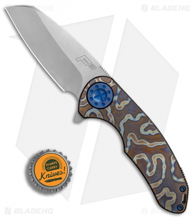 Curtiss Custom F3 Medium Wharncliffe Frame Lock Heat Ano Ti w/ Blue HW (3.1" SW)