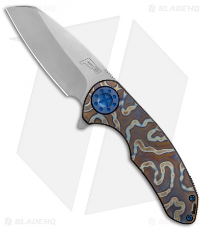 Curtiss Custom F3 Medium Wharncliffe Frame Lock Heat Ano Ti w/ Blue HW (3.1" SW)